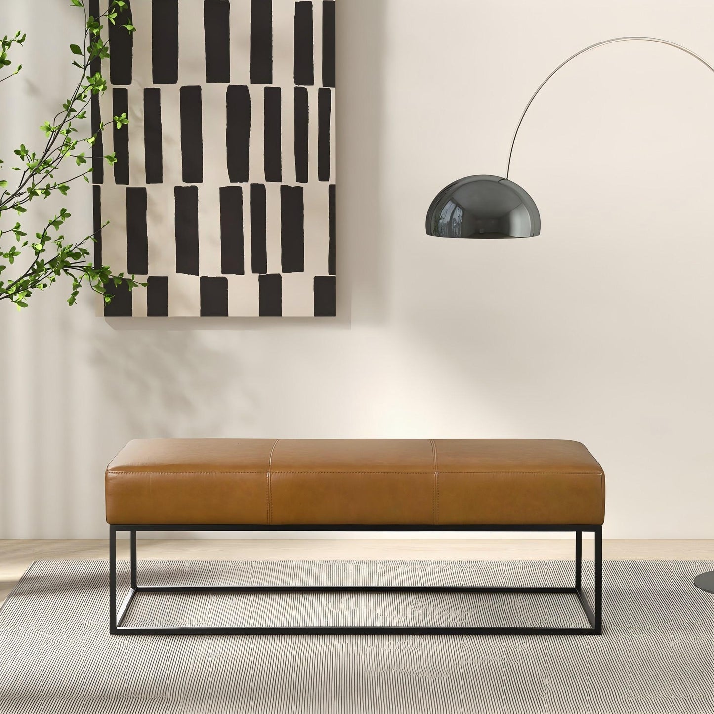 Modern brown leather bench with metal legs in a minimalist living room, FredCo International furniture