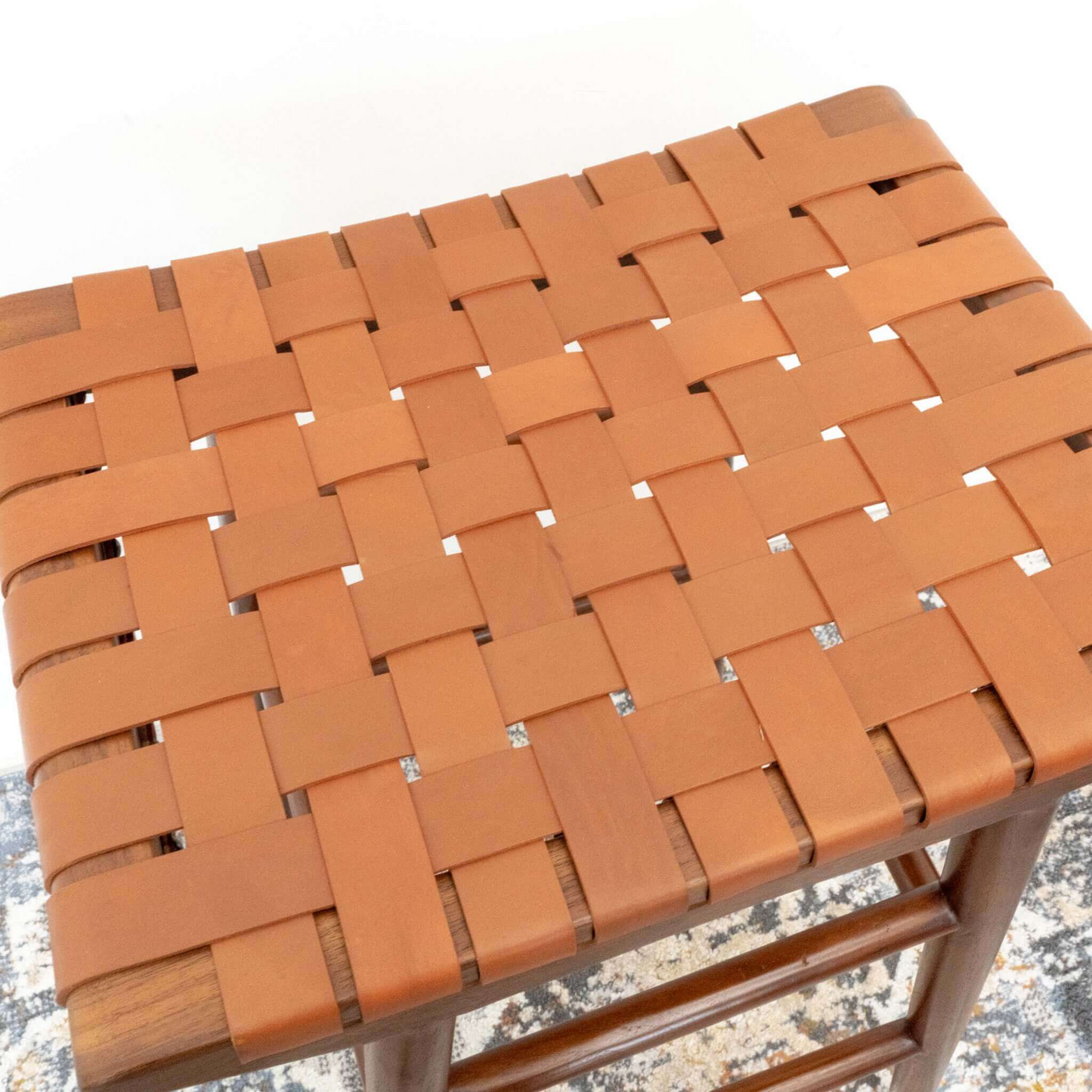 Brown woven leather bar stool seat on wood frame, FredCo International furniture