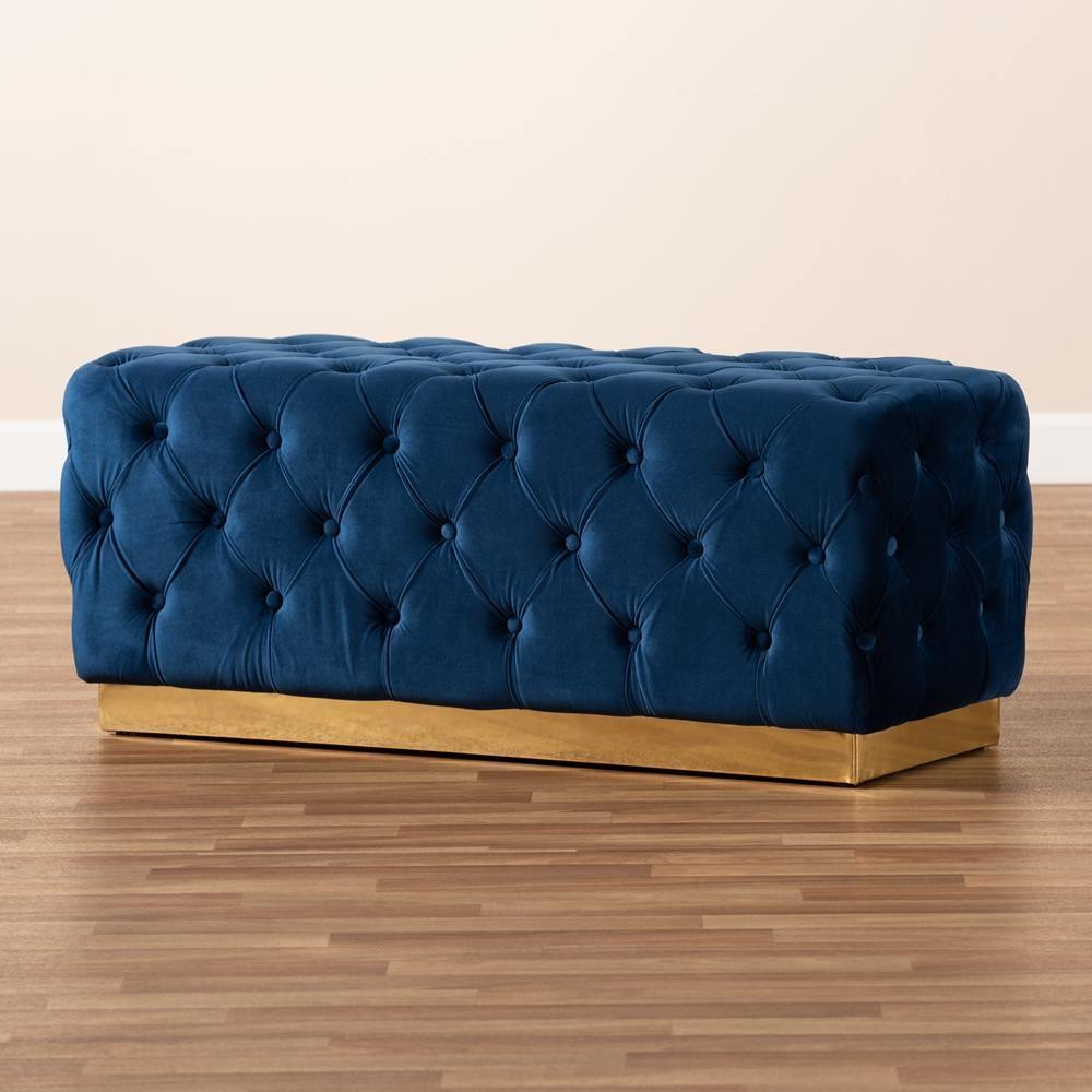 Corrine Glam and Luxe Navy Blue Velvet Fabric Upholstered and Gold PU Leather Ottoman FredCo