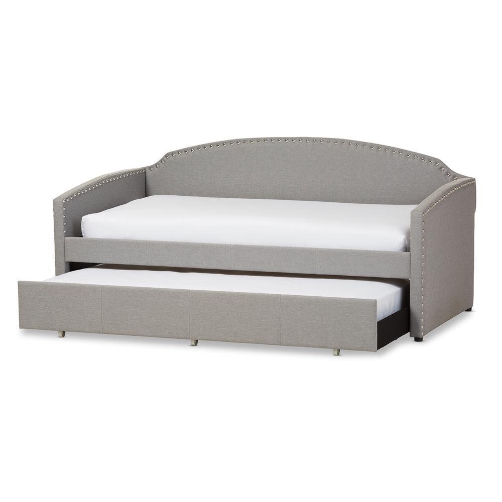 Lanny Modern and Contemporary Grey Fabric Nail Heads Trimmed Arched Back Sofa Twin Daybed with Roll-Out Trundle Guest Bed FredCo