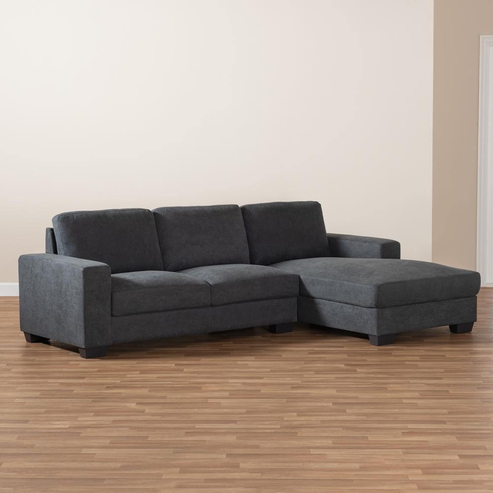 Nevin Modern and Contemporary Dark Grey Fabric Upholstered Sectional Sofa with Right Facing Chaise FredCo
