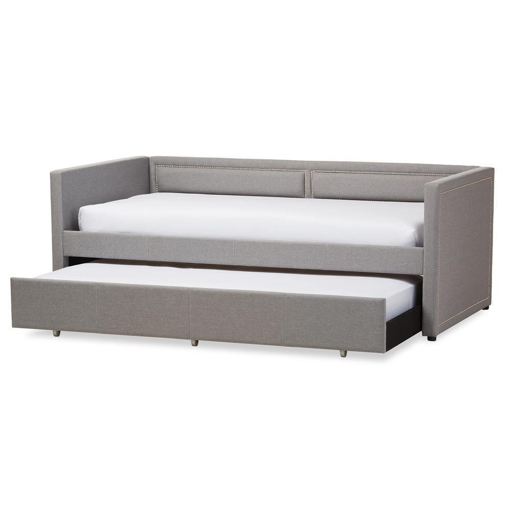 Raymond Modern and Contemporary Grey Fabric Nail Heads Trimmed Sofa Twin Daybed with Roll-Out Trundle Guest Bed FredCo