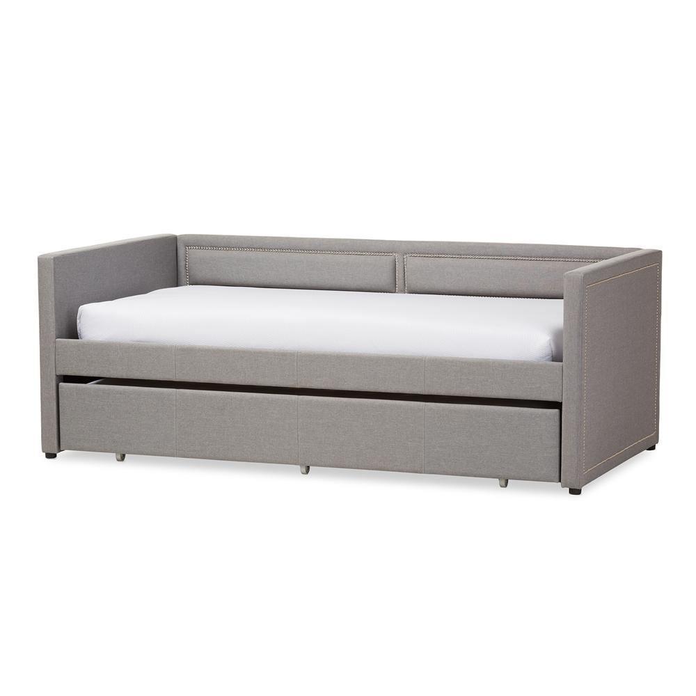 Raymond Modern and Contemporary Grey Fabric Nail Heads Trimmed Sofa Twin Daybed with Roll-Out Trundle Guest Bed FredCo