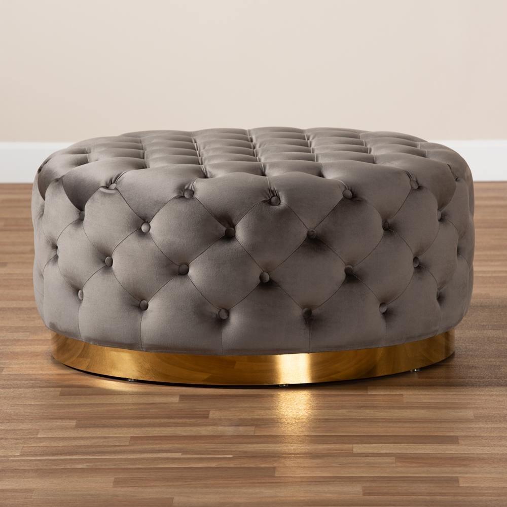 Sasha Glam and Luxe Grey Velvet Fabric Upholstered Gold Finished Round Cocktail Ottoman FredCo