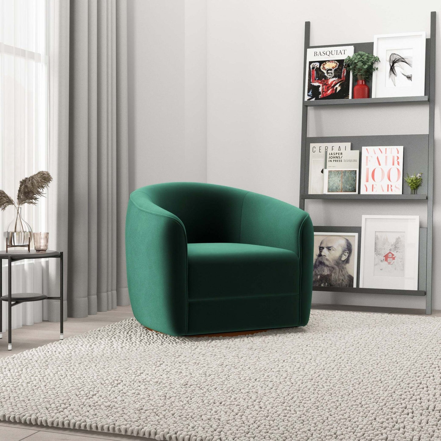Modern green accent chair in a stylish living room with bookshelf and textured rug