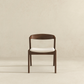 Modern wooden dining chair with white cushion on neutral background, FredCo International furniture