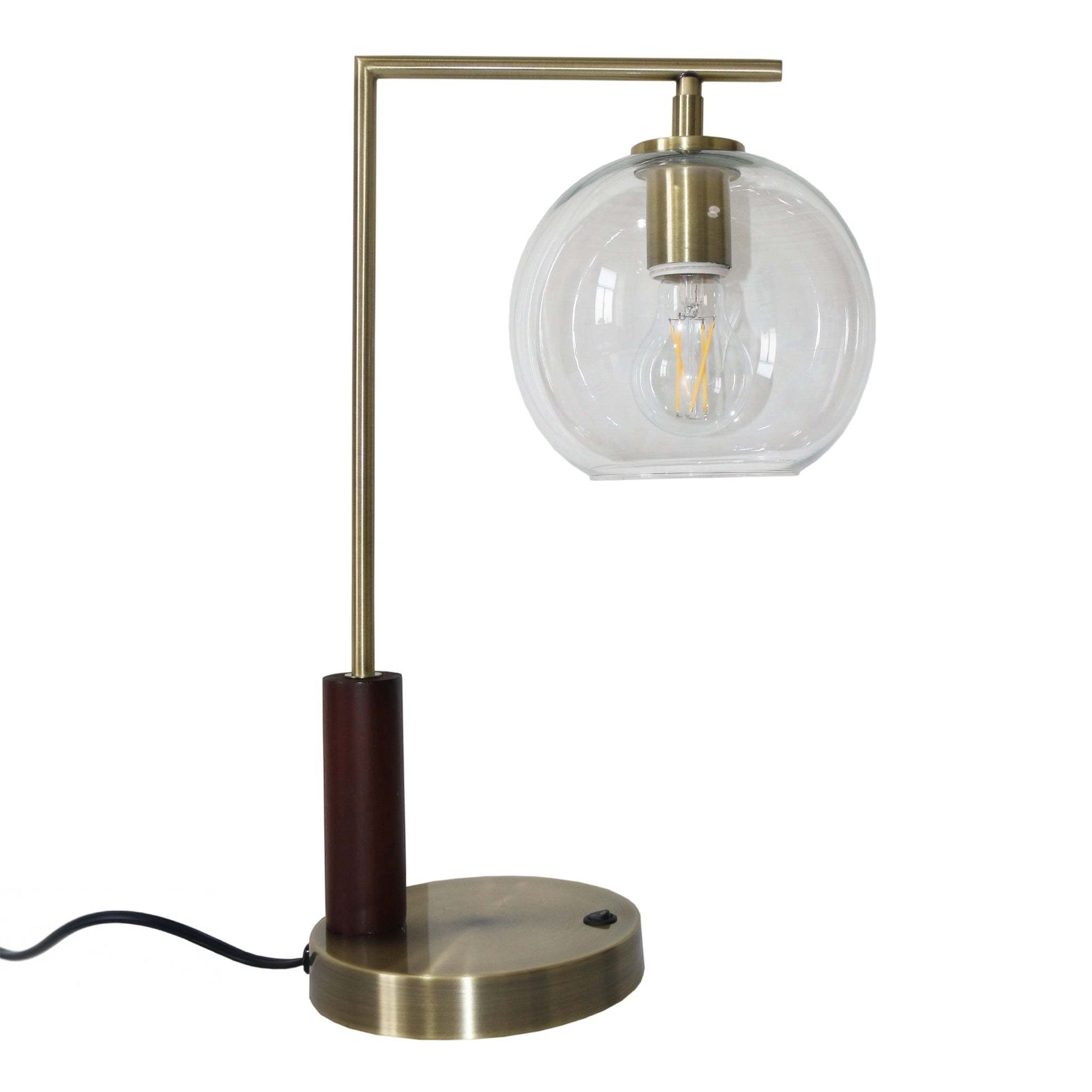 Modern brass table lamp with clear glass globe shade, home furniture accessory