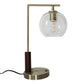 Modern brass table lamp with clear glass globe shade, home furniture accessory