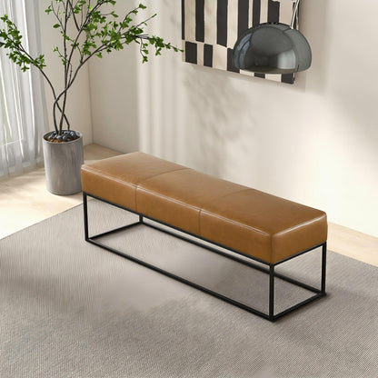 Modern brown leather bench with black metal frame in stylish living room, FredCo International furniture