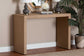Beige console table with decorative items against a beige wall.