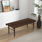 Modern slatted wooden bench in a bright living room with a plant and wall decor, FredCo International furniture