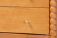 Baxton Studio Lucera Mid-Century Oak Brown Bobbin Wood 4-Drawer Chest