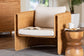 bali & pari Carina Natural Rattan Armchair with Cushion - Handwoven Lounge Chair with U-Shaped Silhouette and Deep Seating for Boho, Coastal, or Tropical Living Spaces