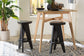 bali & pari Roy Wood Counter Stool - Sculptural Backless Accent Stool with Geometric Base and Integrated Footrest, Black