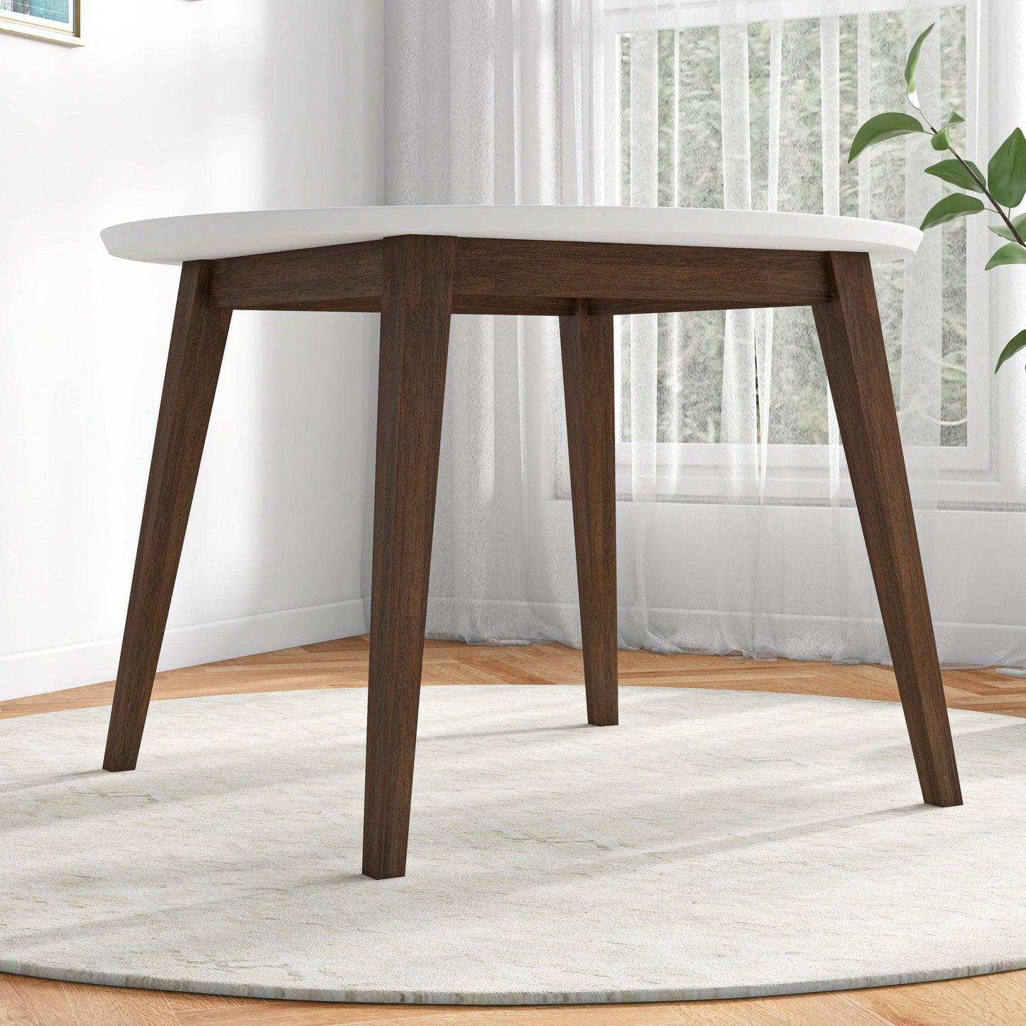 Modern wood dining table with white top in bright living room, FredCo International furniture
