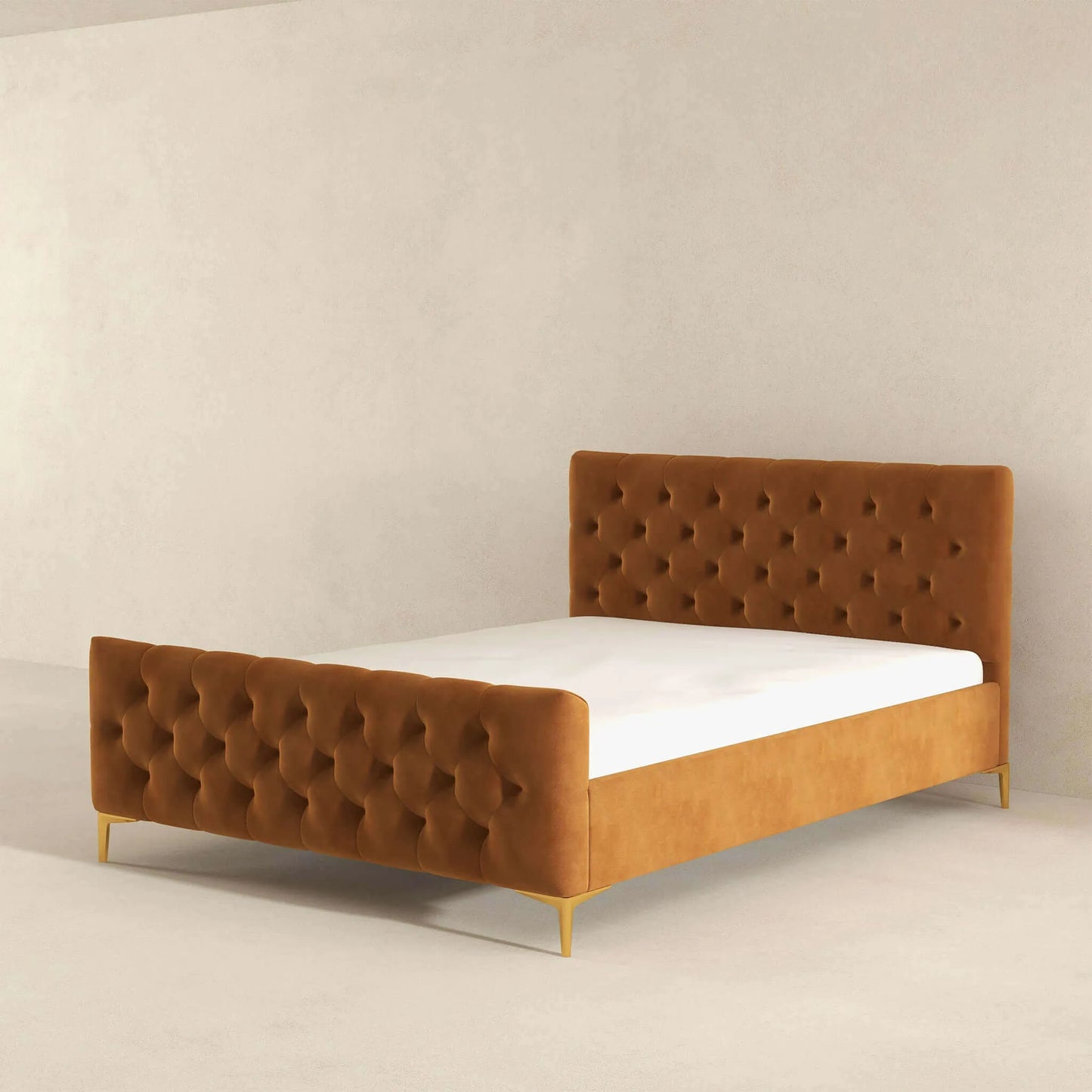 Upholstered tufted bed frame with gold legs in modern minimalist bedroom, FredCo International furniture