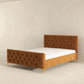 Upholstered tufted bed frame with gold legs in modern minimalist bedroom, FredCo International furniture