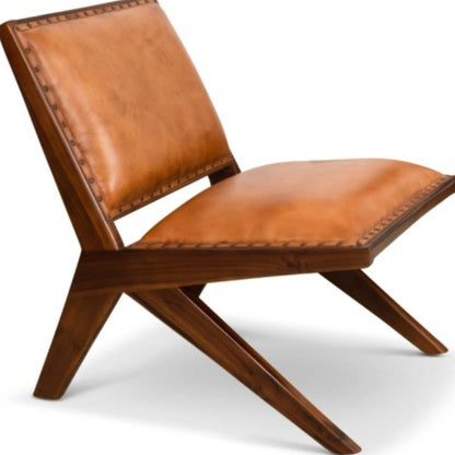 Mid-century modern accent chair with tan leather upholstery and wooden frame, FredCo furniture