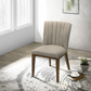 Modern upholstered accent chair with wooden legs in bright living room at FredCo International