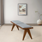 Modern wooden bench with gray cushion in stylish living room, FredCo International furniture