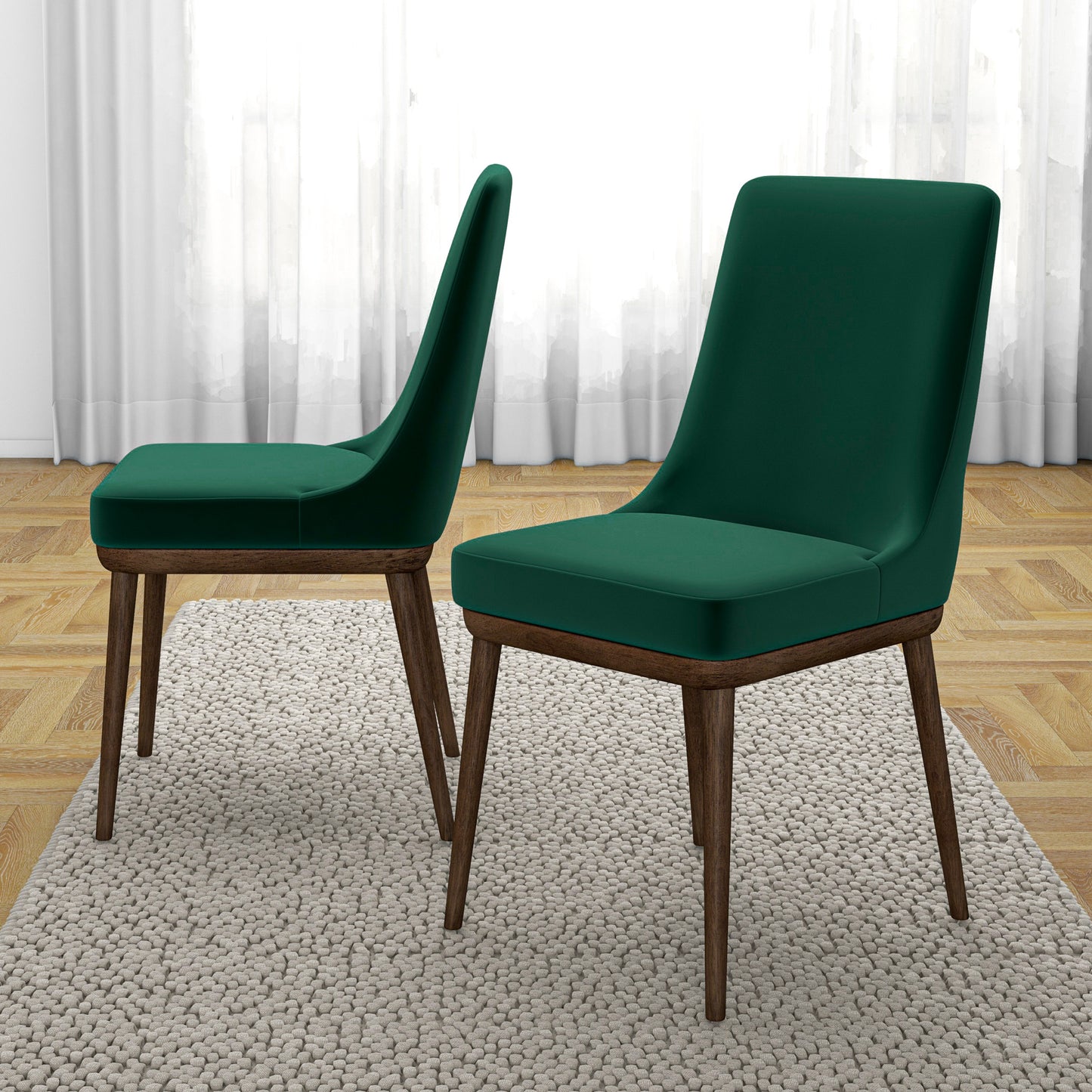 Set of two modern green dining chairs with wooden legs on textured rug in bright room