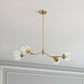 Modern gold chandelier with three glass globes, ceiling mount, home lighting from FredCo International