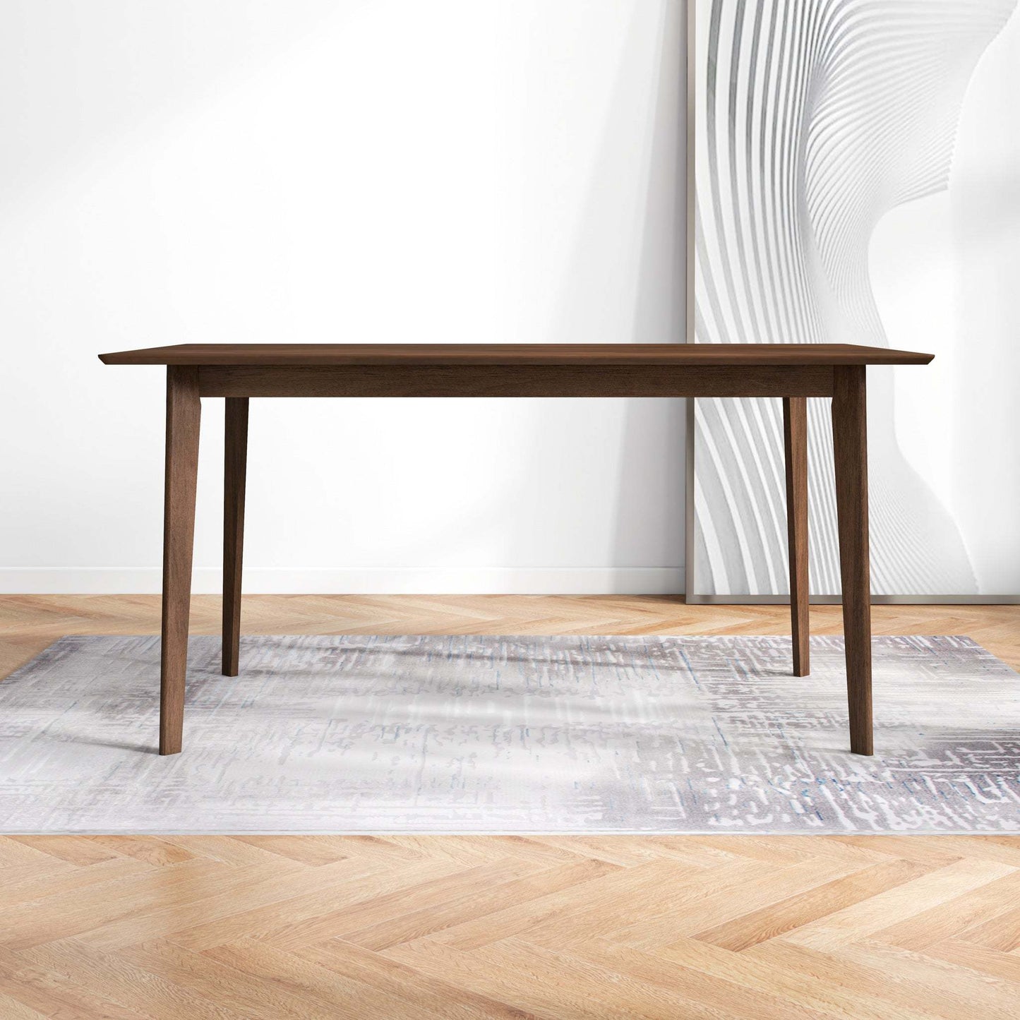 Modern wooden dining table on rug in bright room, FredCo International furniture