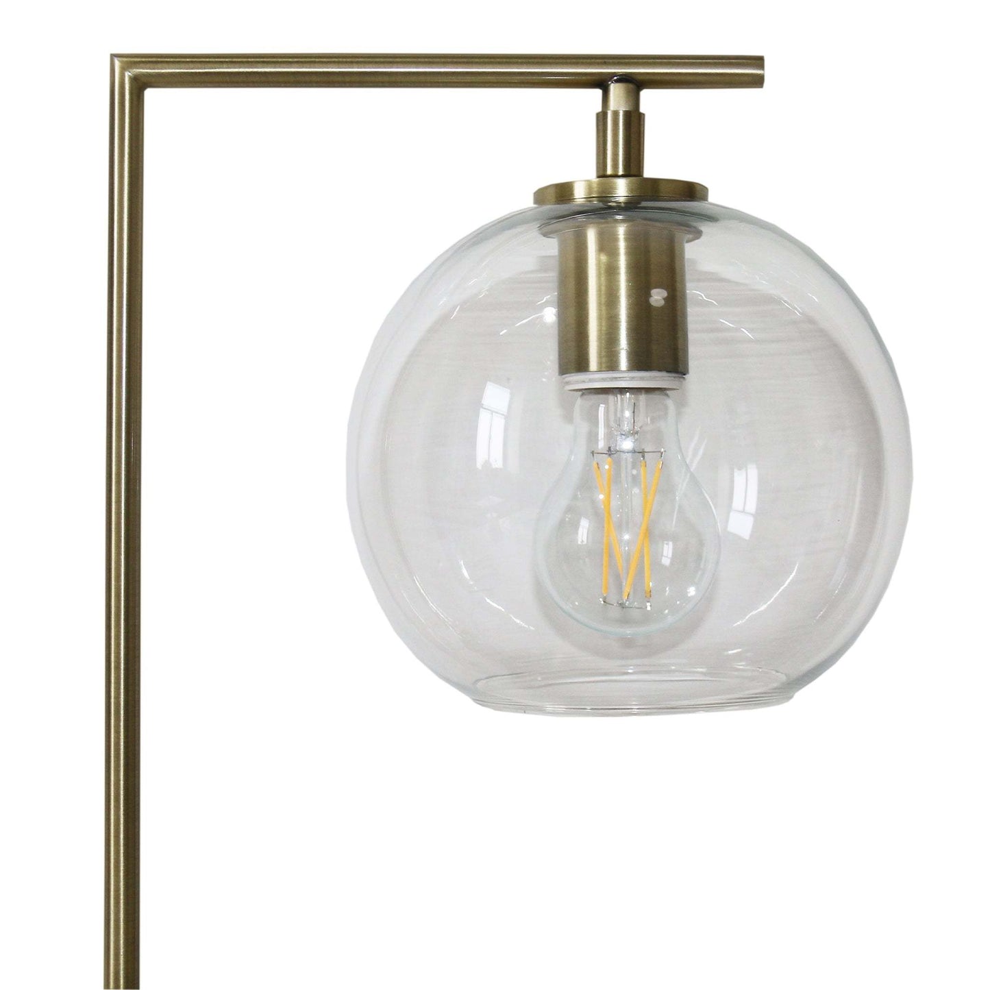 Modern brass lamp with clear glass globe shade and exposed bulb from FredCo International