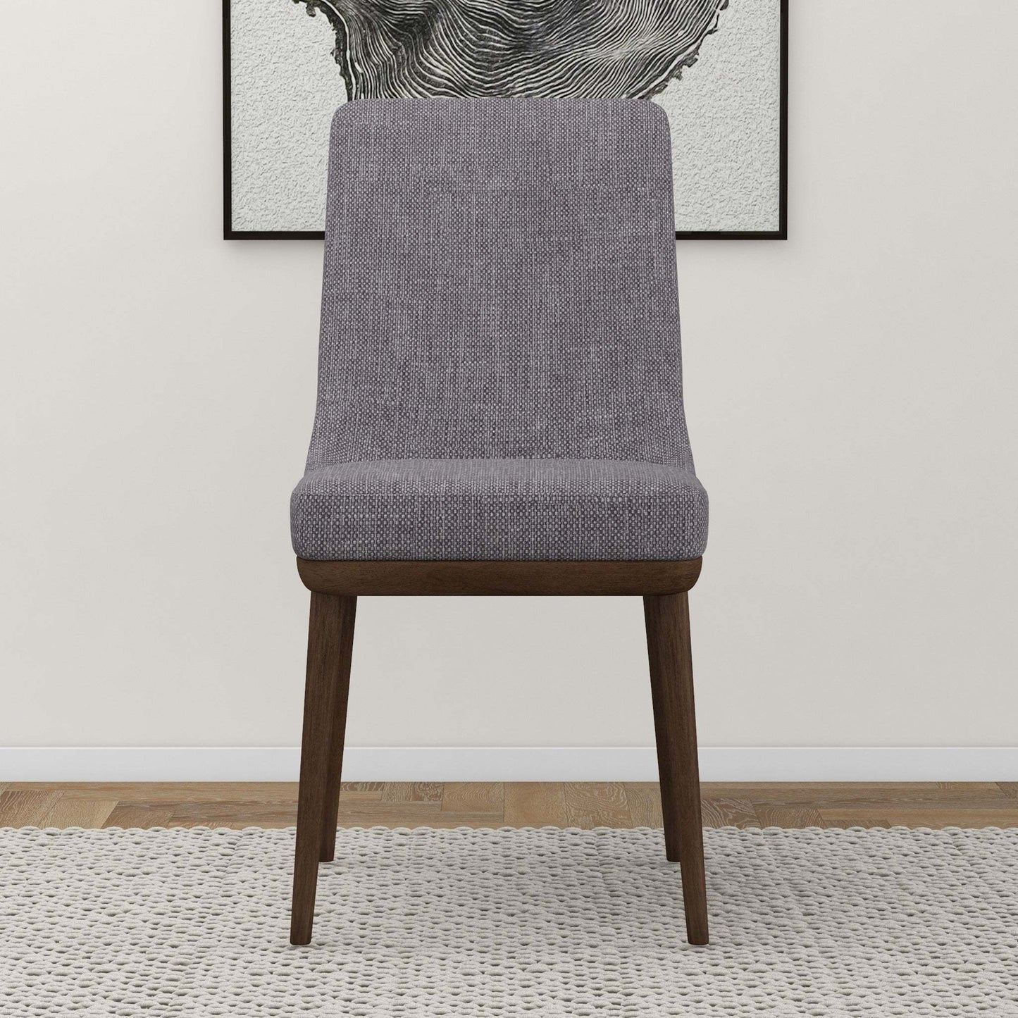 Modern gray upholstered dining chair with wooden legs on rug, FredCo International furniture