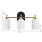 Modern three-light brass and black wall sconce with white glass shades, home lighting, 20.5 inches wide.