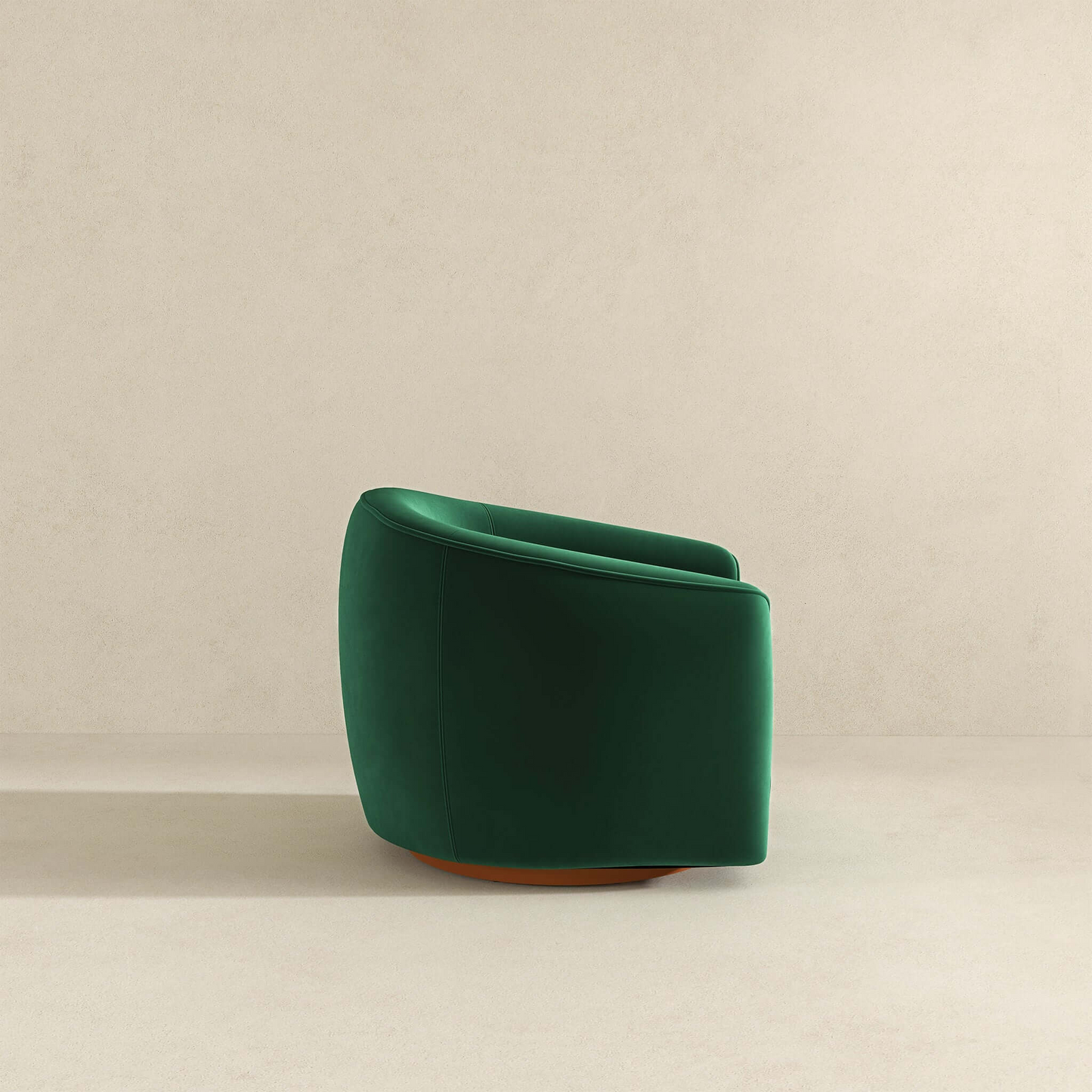 Modern green velvet accent chair on beige background, FredCo International furniture