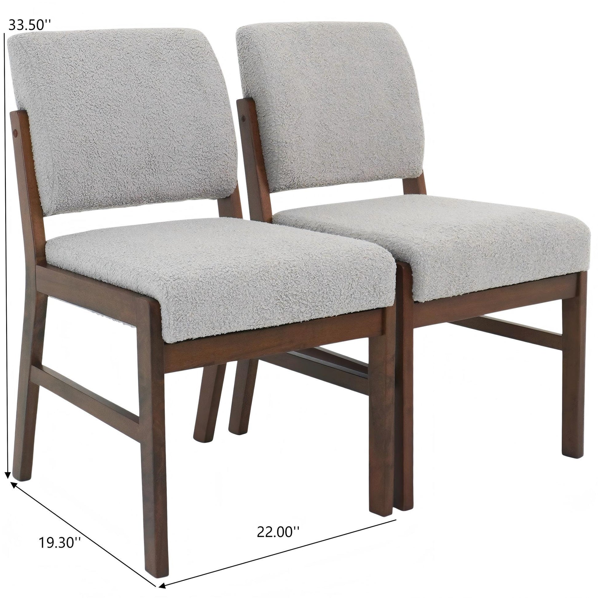 Pair of modern dining chairs with gray upholstery and wooden frames, furniture at FredCo International
