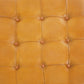 Close-up of tan tufted leather furniture upholstery, FredCo International home decor
