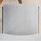 Light gray textured fabric dining chair with wooden frame on beige carpet, FredCo International
