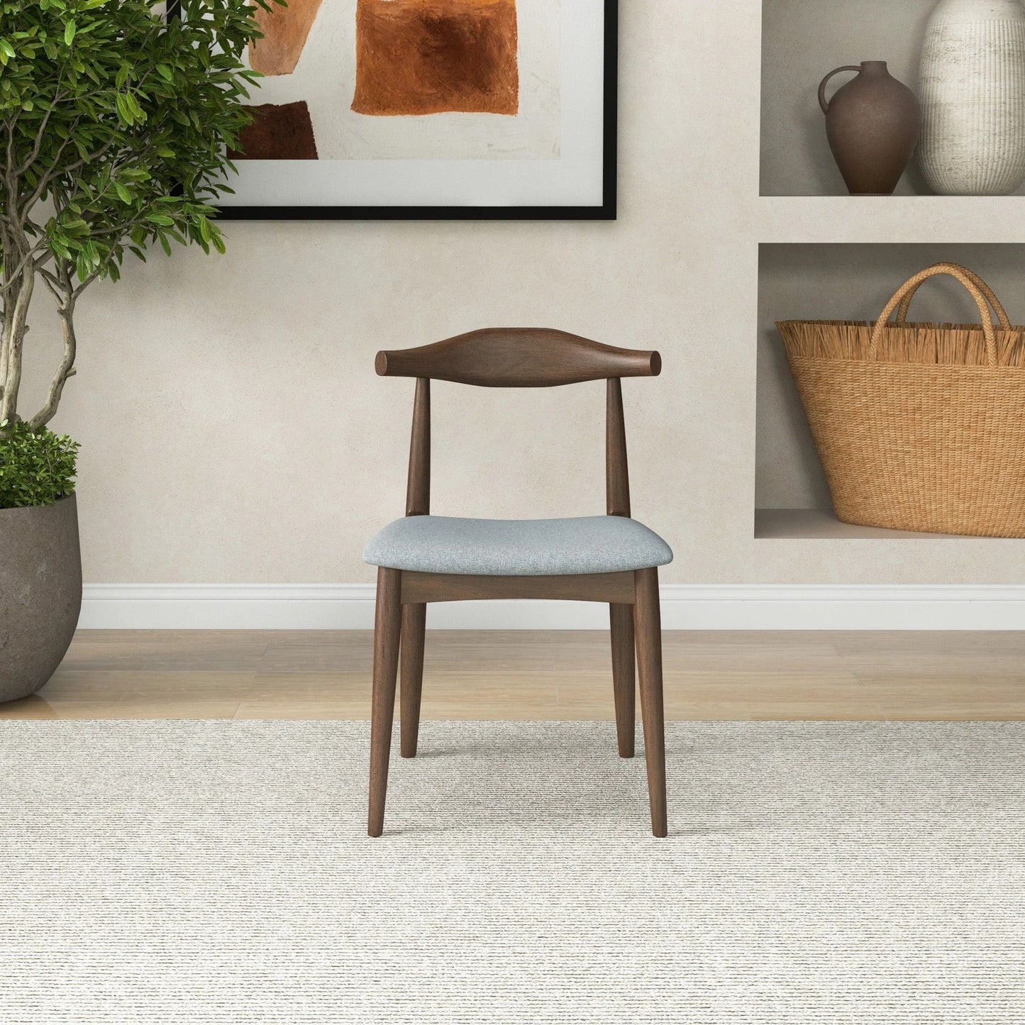 Mid-century modern wooden chair with gray cushion in stylish living room setting from FredCo International
