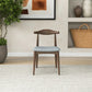 Mid-century modern wooden chair with gray cushion in stylish living room setting from FredCo International