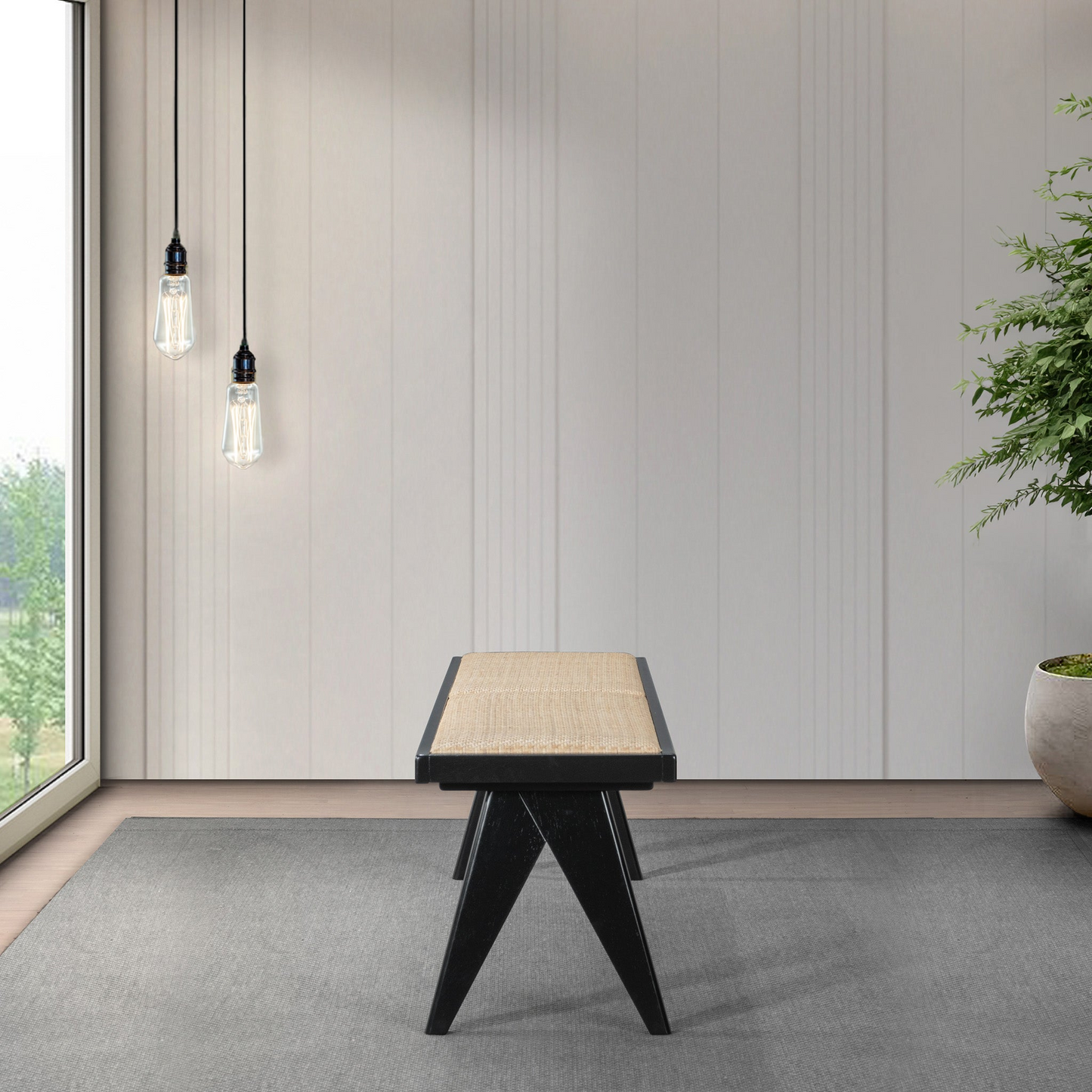 Modern bench with woven seat in a minimalist living room, pendant lights and indoor plant