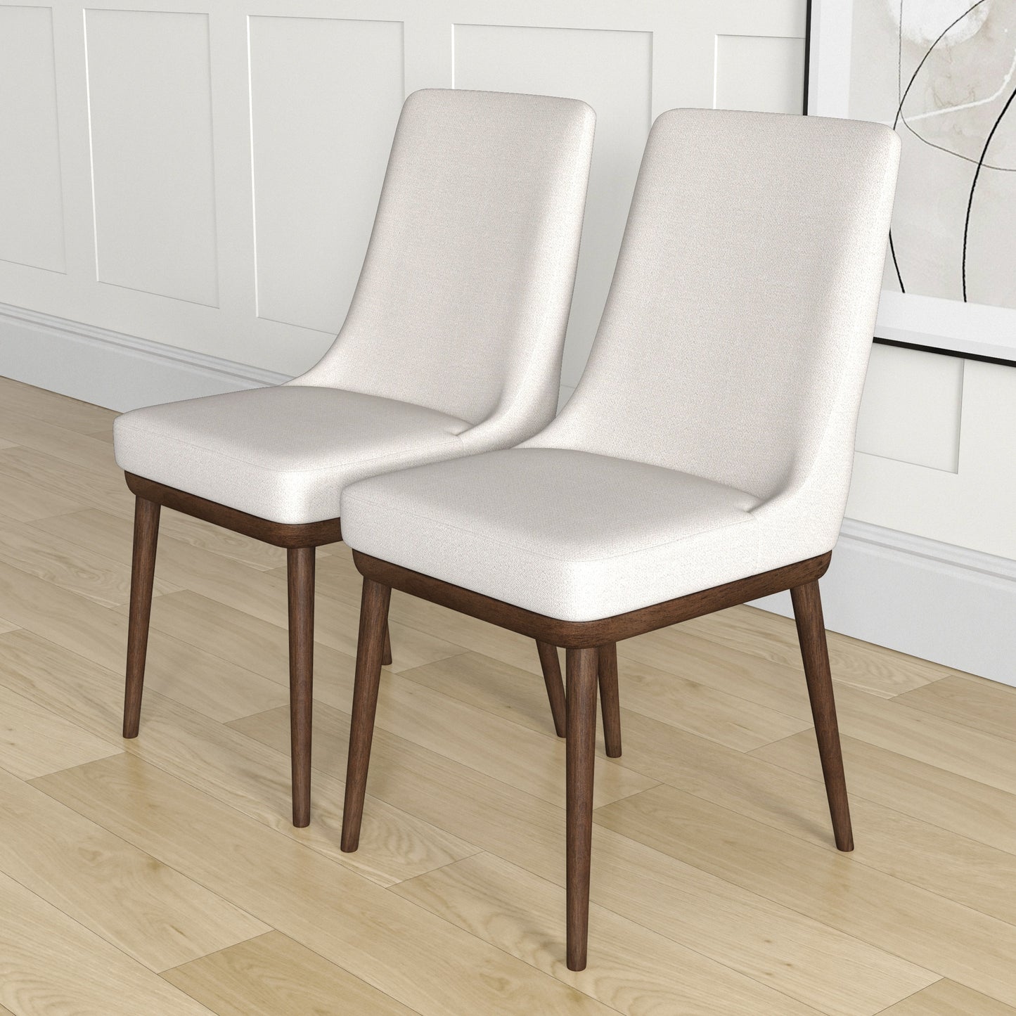 Pair of modern upholstered dining chairs with wooden legs on light wood floor, FredCo International