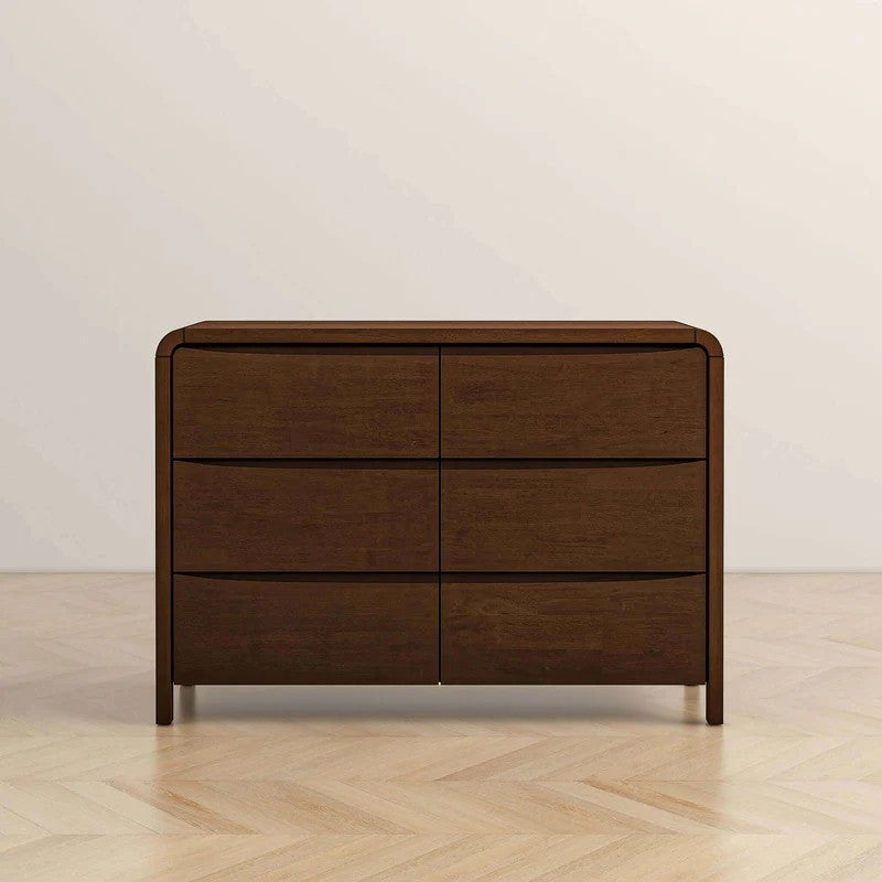 Modern dark wood dresser with six drawers on light herringbone floor, FredCo International furniture