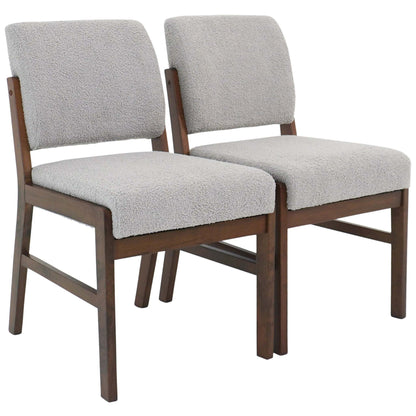 Pair of modern upholstered dining chairs with light grey fabric and dark wood frames, FredCo furniture