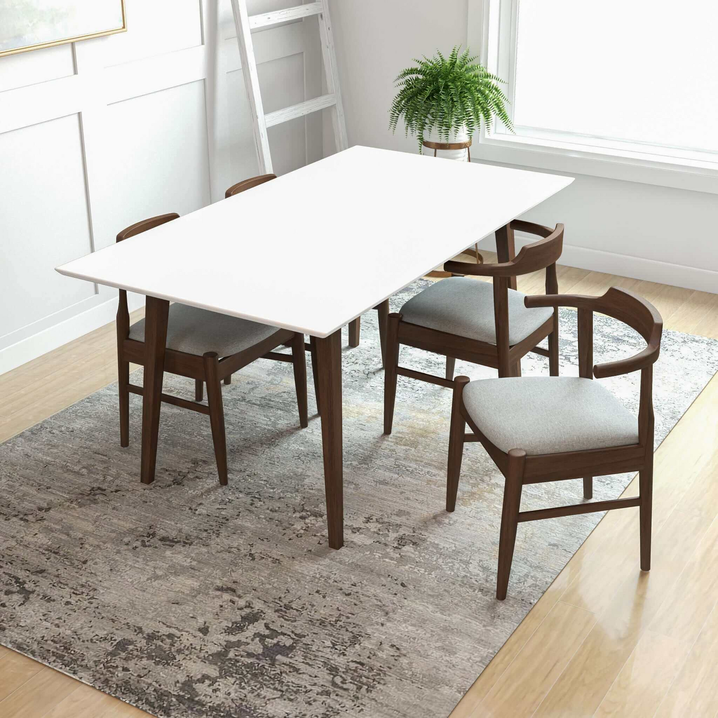 Modern dining room with white table, four wooden chairs, rug, and plant by FredCo International