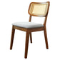 Modern wooden dining chair with cane backrest and gray upholstered seat from FredCo International