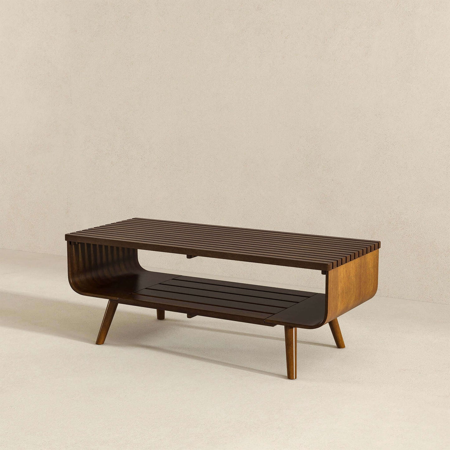 Mid-century modern slatted wood coffee table with open shelf on light background