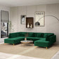 Modern living room with green sectional sofa, round coffee table, and wall decor by window