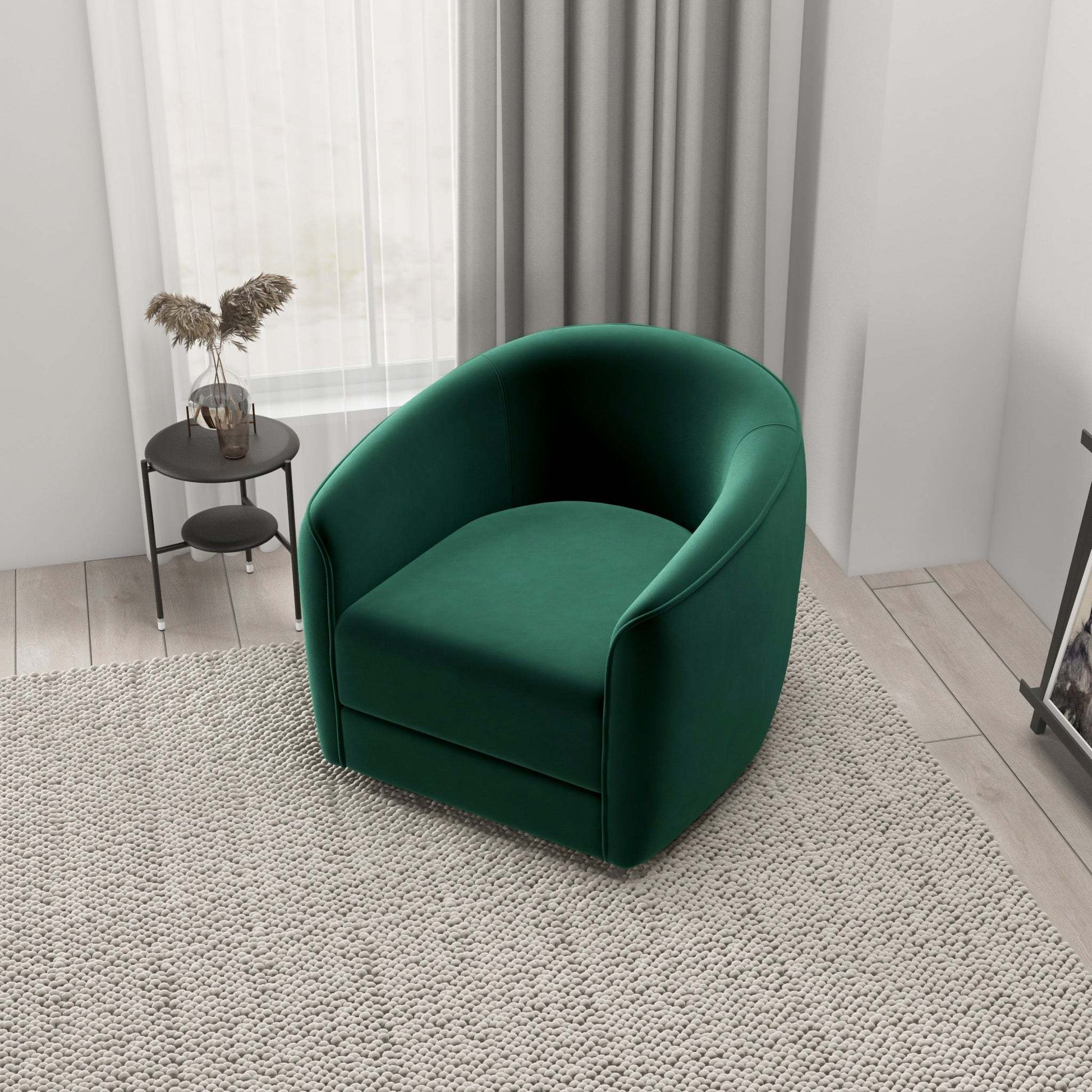 Modern green accent chair in a cozy living room with neutral decor and textured rug