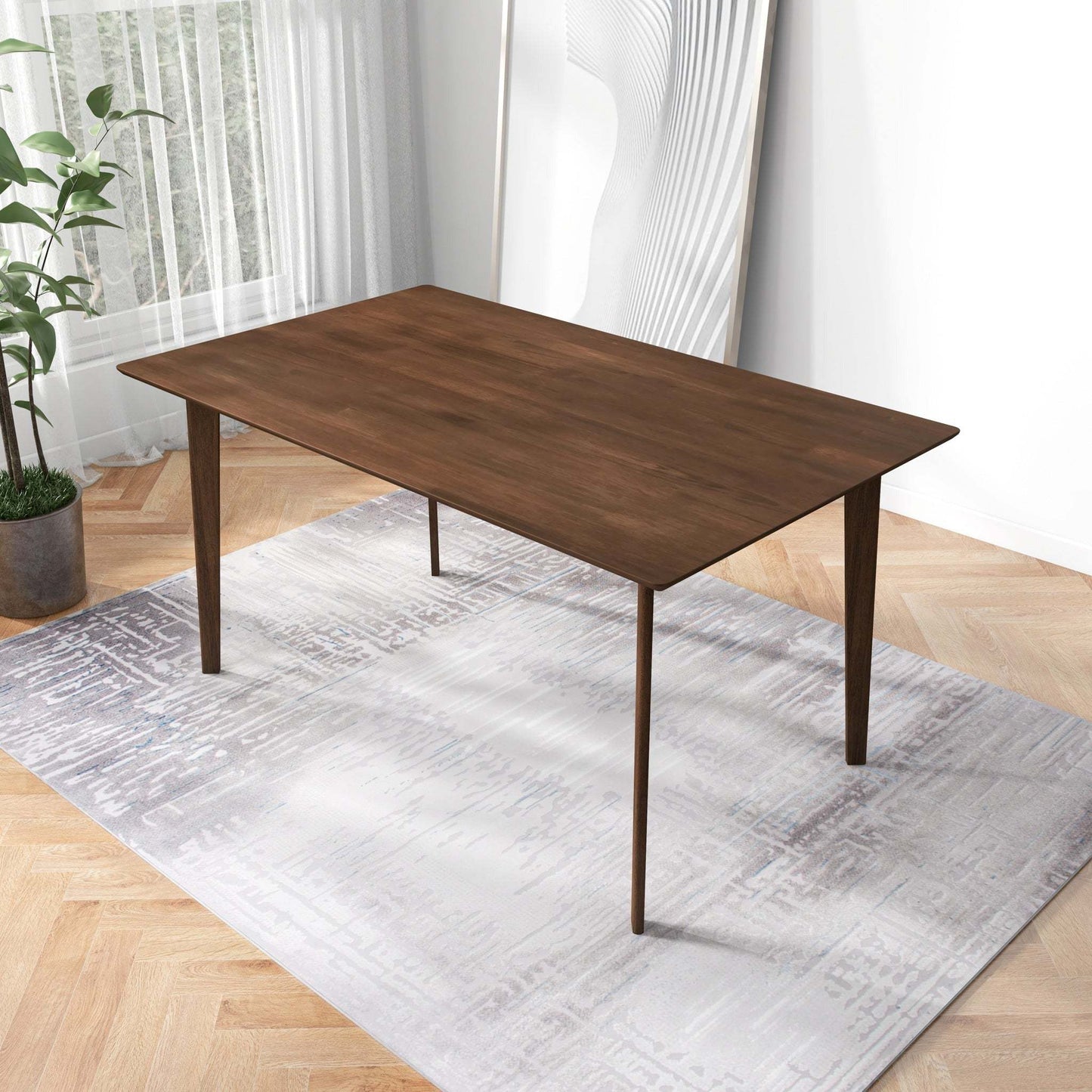 Modern wooden dining table on patterned rug in bright home interior, FredCo International furniture