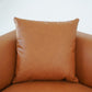 Brown leather accent pillow on matching armchair, modern home furniture from FredCo International