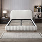 Modern white upholstered bed frame with textured headboard in elegant bedroom setting, FredCo International furniture.