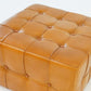 Tan tufted leather ottoman with button details, modern home furniture from FredCo International