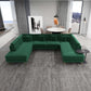 Modern green sectional sofa in a bright living room with dining area, large windows, and gray rug